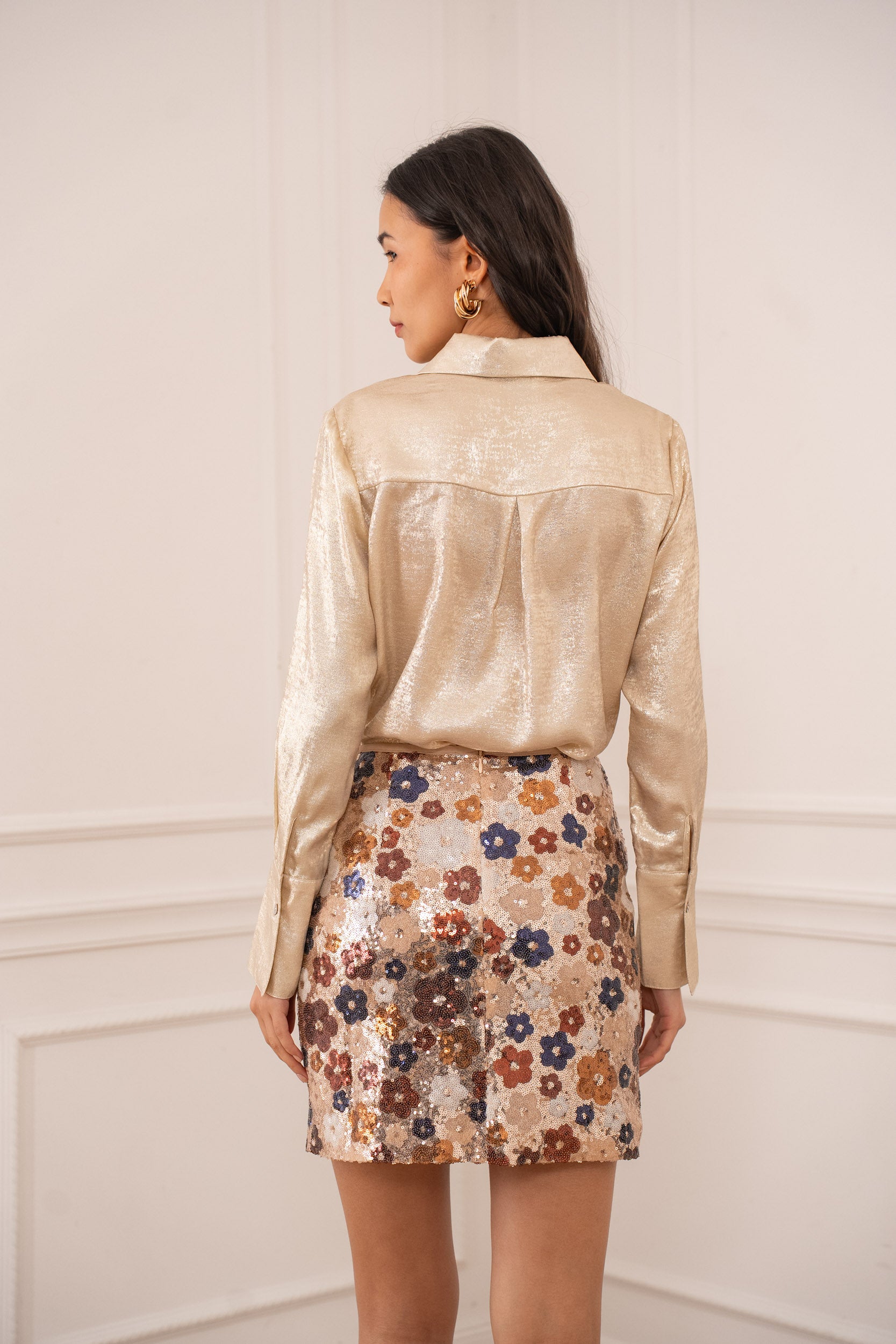 Jupe courte à sequins fleuris