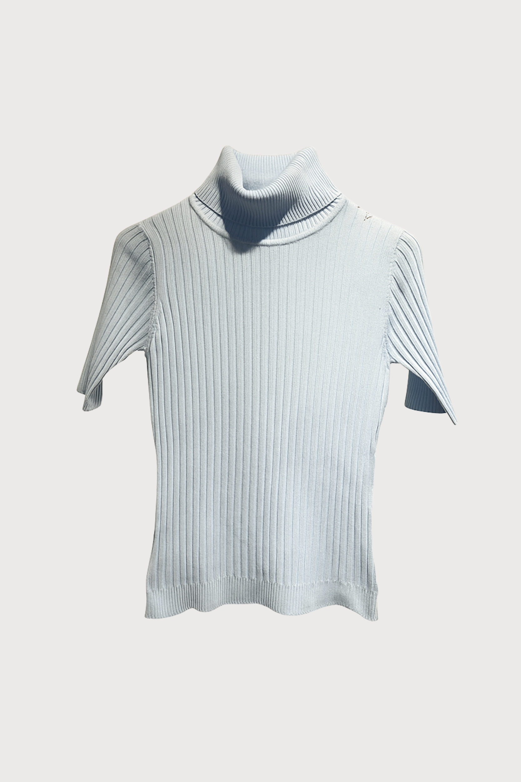 Top col roulé en maille côtelée