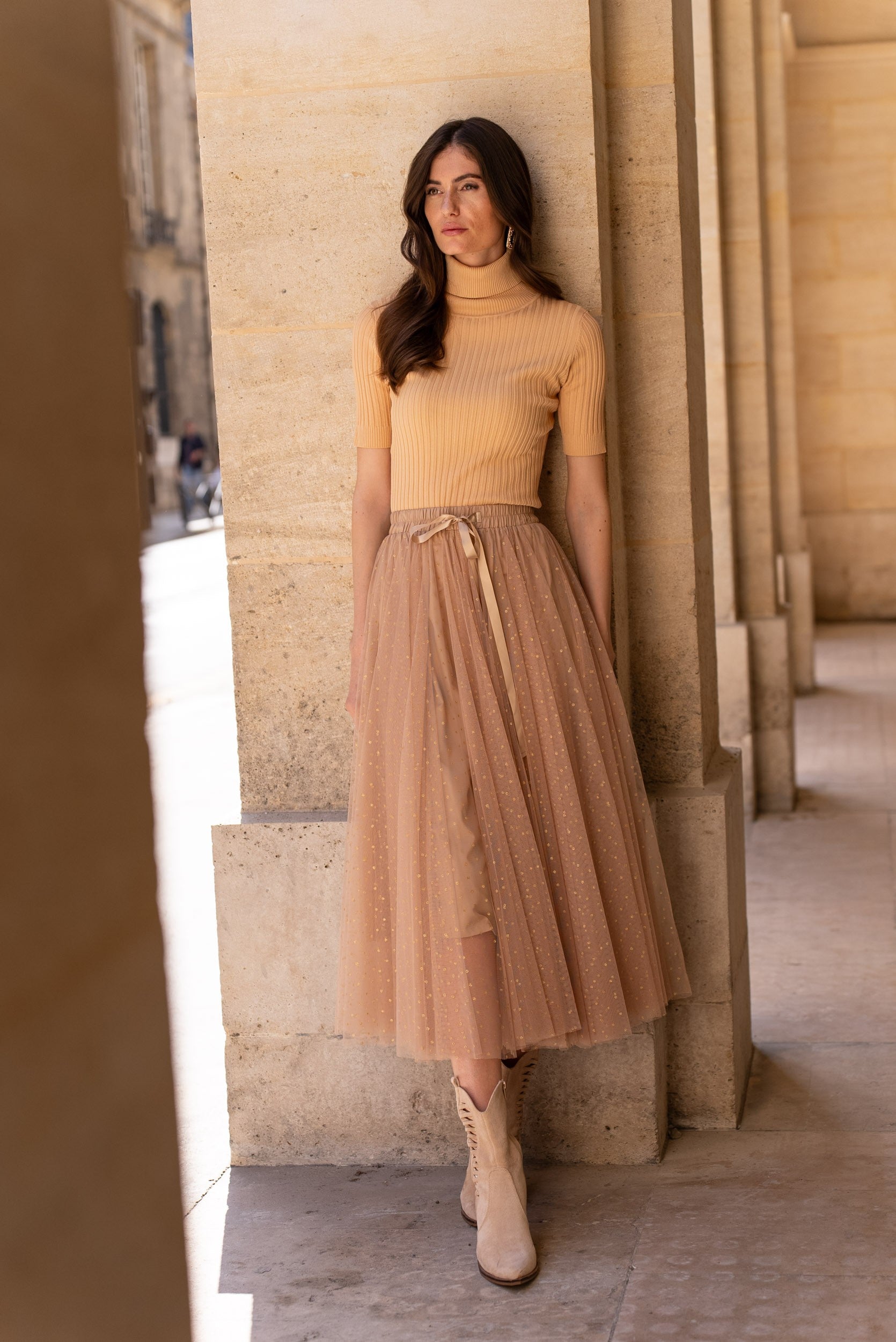 Top col roulé en maille côtelée